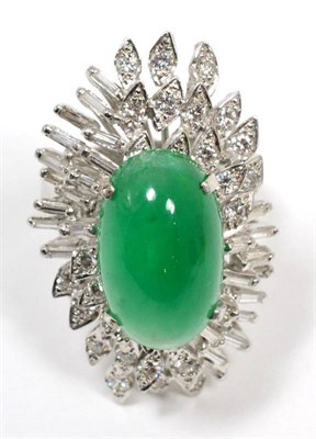 Lot 203 - An 18 carat white gold green quartz and diamond cluster ring, an oval cabochon green quartz in...