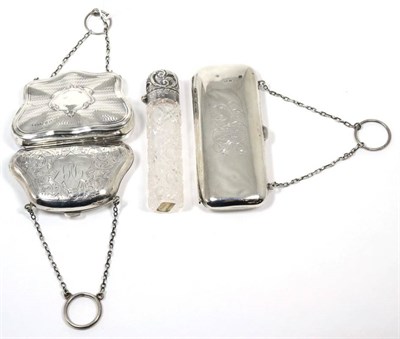 Lot 206 - Three silver purses; and a silver mounted cut glass scent bottle