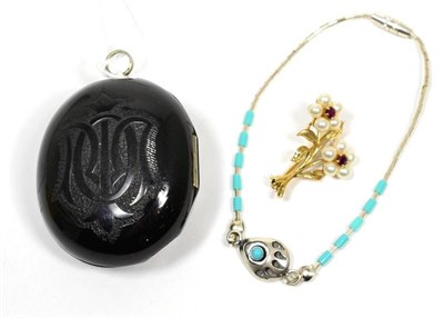 Lot 229 - A Victorian jet locket; a 9 carat floral spray brooch and a 925 North American bracelet (3)