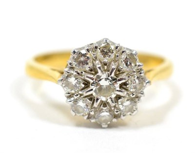 Lot 235 - A diamond cluster ring, total estimated diamond weight 0.50 carat approximately, finger size...