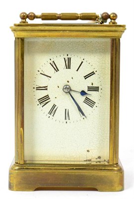 Lot 247 - A brass carriage clock with twin barrel striking movement