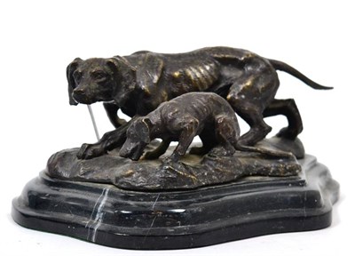 Lot 292 - A bronze group of a hound and puppy, on black marble base, signed Barye