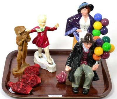 Lot 300 - A Royal Worcester figure modelled by Doughty ''January''; two Doulton figures; a carved figure; and