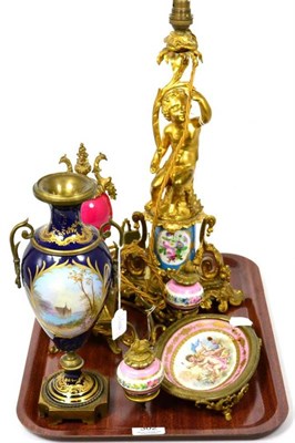 Lot 302 - A French gilt metal and porcelain figural cherub lamp; a French gilt metal and porcelain desk...