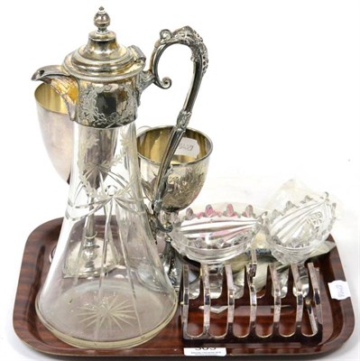 Lot 303 - A silver goblet, a silver plate mounted glass claret jug, a quantity of silver tea spoons,...