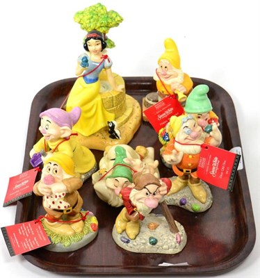 Lot 310 - Royal Doulton Disney showcase figures, Snow White and the Seven Dwarfs, complete set