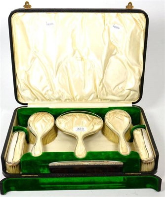 Lot 323 - A Walker & Hall silver backed five piece dressing table set, cased