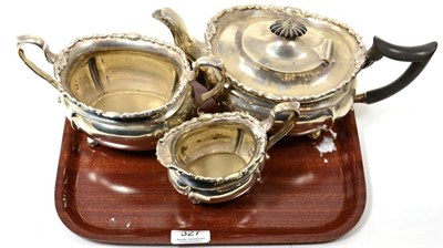 Lot 327 - A silver three piece tea service, Birmingham 1906, by William Aitken