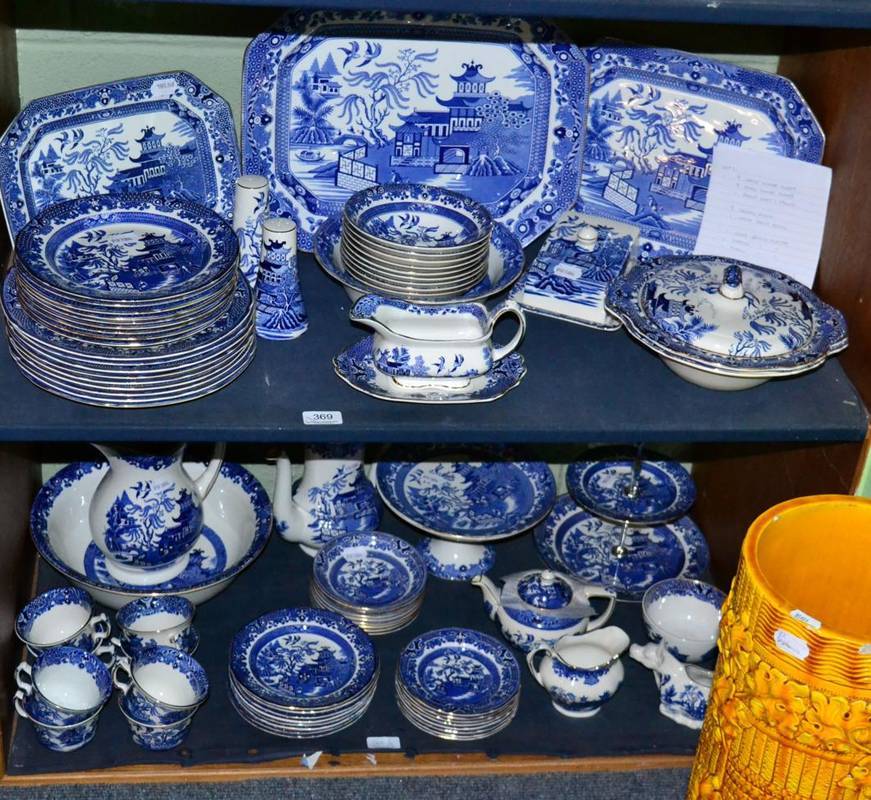 Lot 369 - A Burleigh ware ''Willow'' pattern dinner and tea service; and a similar jug and basin (two...