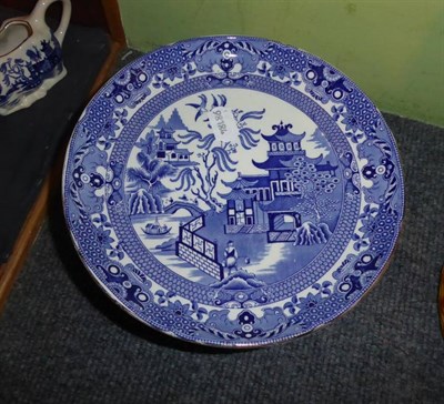 Lot 369 - A Burleigh ware ''Willow'' pattern dinner and tea service; and a similar jug and basin (two...