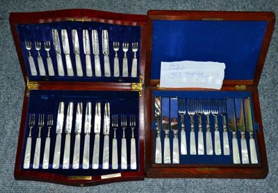 Lot 385 - A set of twelve silver and mother of pearl fruit knives and forks; Sheffield 1927, by Z Barraclough