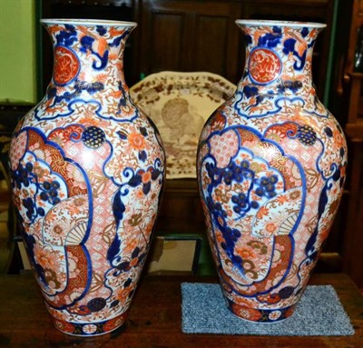 Lot 386 - A pair of late 19th/early 20th century Japanese Imari vases