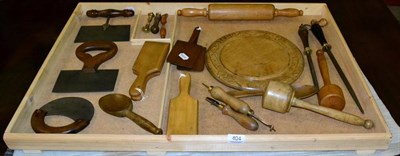 Lot 404 - A group of kitchenalia including pie cutters; butter bats; knife sharpeners; cutters etc