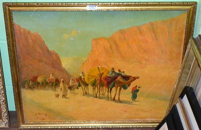 Lot 1024 - Vincent Manago (1880-1936), orientalist scene of a camel train, oil on canvas, signed lower left