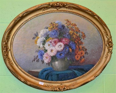 Lot 1031 - A still life study of flowers, oil on canvas, signed N Hopflinner, framed in an oval gilt frame