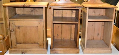 Lot 1115 - A pair of pine bedside tables and another similar (3)