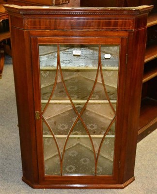 Lot 1126 - A glazed corner cupboard