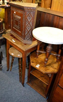 Lot 1128 - Four various tables, one with a marble top; and a cast oak corner cupboard