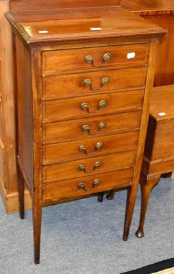 Lot 1132 - An Edwardian inlaid mahogany music cabinet