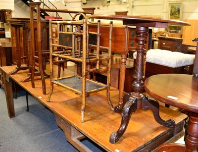 Lot 1137 - A bamboo magazine rack; a drop flap bedside table and a tripod table