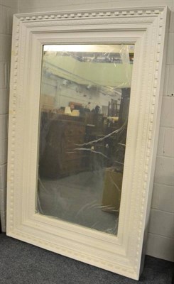 Lot 1164 - A large white painted wooden framed mirror
