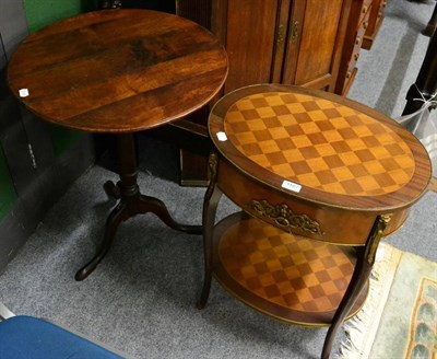 Lot 1167 - A gilt metal mounted oval side table and a tripod table (2)