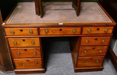 Lot 1170 - A Victorian walnut double pedestal desk