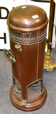 Lot 1199 - A copper twin handled paraffin lamp/heater,  Verity Brothers