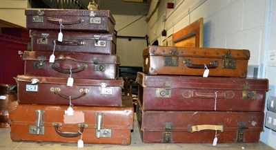 Lot 1231 - Nine assorted brown leather and other smaller suitcases (9)