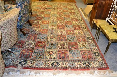 Lot 1263 - Machine made carpet of Persian garden design, 402cm by 300cm