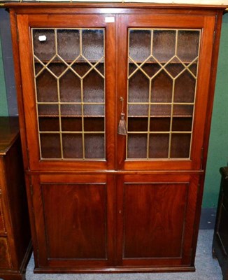 Lot 1266 - A part glazed bookcase