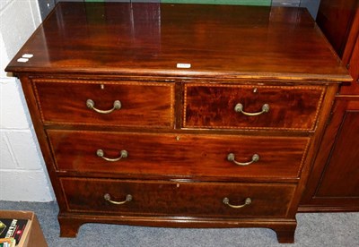 Lot 1267 - An Edwardian mahogany three height chest of drawers