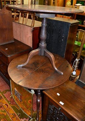 Lot 1275 - Two similar oak tripod tables