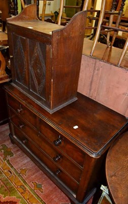 Lot 1277 - An oak hanging cupboard and a three height chest of drawers