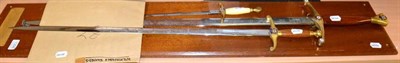 Lot 1306 - Three Wilkinson Sword Ltd. York commemorative swords with letters and cards of authenticity,...