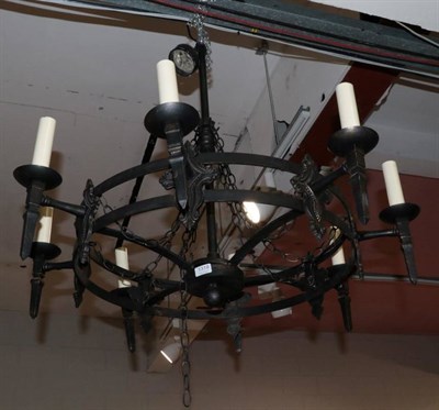 Lot 1318 - A large eight light Medieval style light fitting