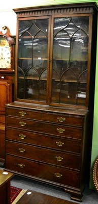 Lot 1328 - An early 19th century mahogany secretaire bureau bookcase