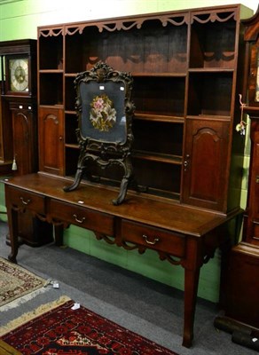 Lot 1330 - A mid-19th century oak dresser, the rack with three shelves above three frieze drawers and a...