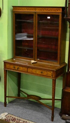 Lot 1332 - A 19th century satinwood inlaid display cabinet