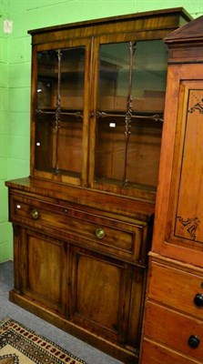 Lot 1338 - Mahogany secretaire bookcase, circa 1840, the upper section with glazed doors, the base with a...