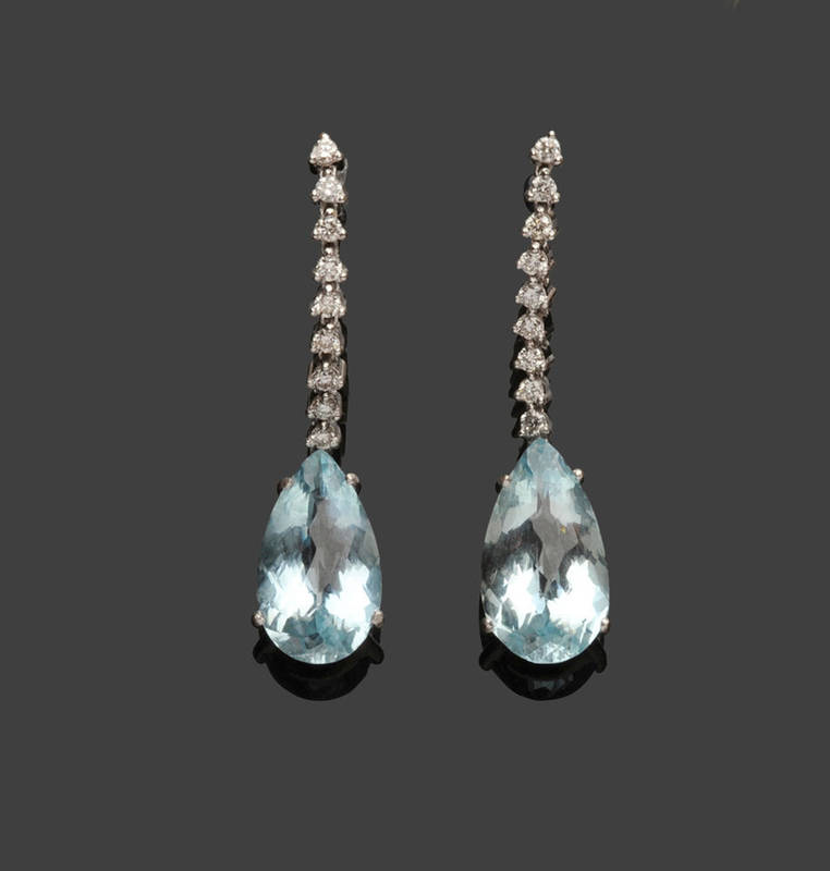 Lot 458 - A Pair of Aquamarine and Diamond Drop Earrings, a string of round brilliant cut diamonds in...
