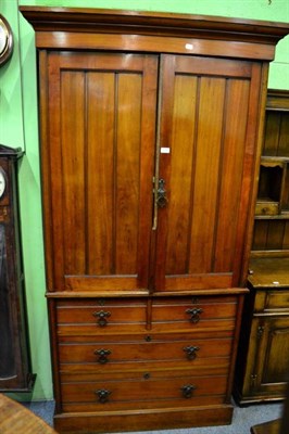 Lot 1342 - A Victorian mahogany linen press with Gothic revival handles, the drawer stamped 'W.Walker &...