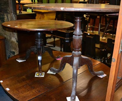 Lot 1346 - Two George III mahogany tripod tables