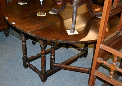 Lot 1347 - Early 18th century 4-6 seater oak gateleg dining table