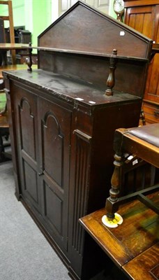 Lot 1352 - Late 19th century architectural oak cupboard with shelved interior, with later superstructure back