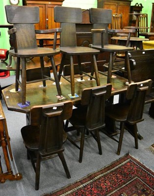 Lot 1354 - A 20th century oak refectory style table and eight matching chairs