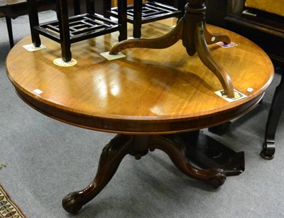 Lot 1357 - A Victorian mahogany circular breakfast table with turned and carved support