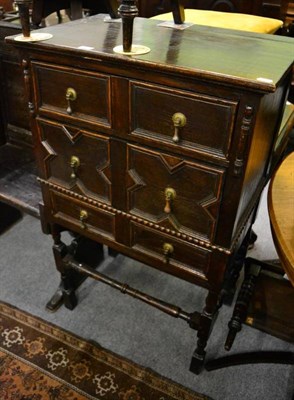 Lot 1359 - An oak chest on stand of 17th century style