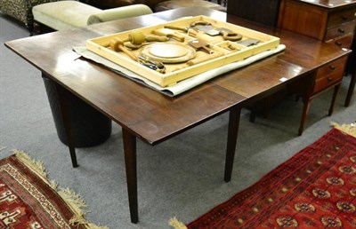 Lot 1382 - A mahogany drop leaf dining table