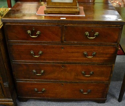 Lot 1383 - An early 19th century mahogany four height chest of drawers